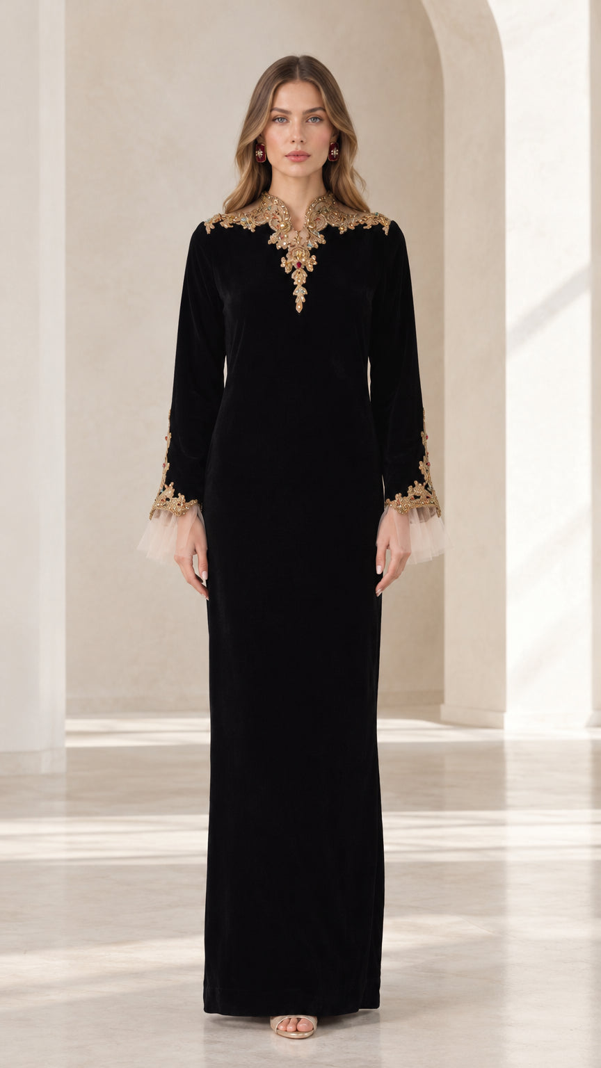 Front view of black embroidered velvet maxi dress with beaded neckline and tulle cuffs