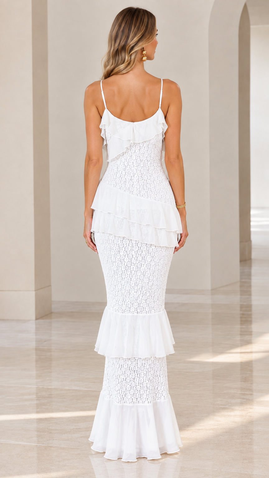 Back view of model wearing white tiered ruffle lace maxi dress