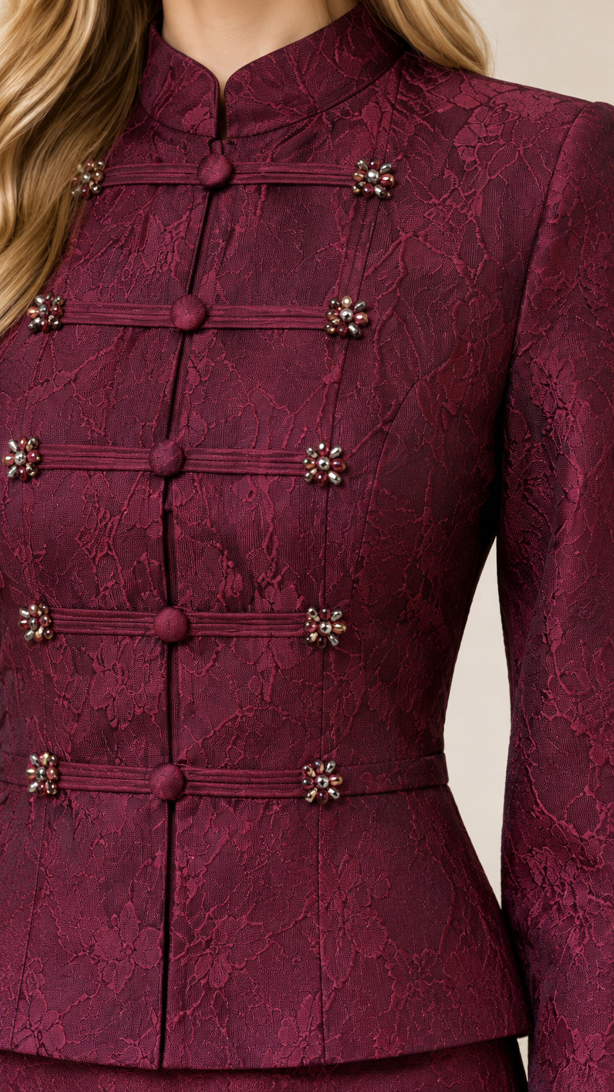 Close-up detail of mandarin collar and embellished frog closures on lace peplum jacket