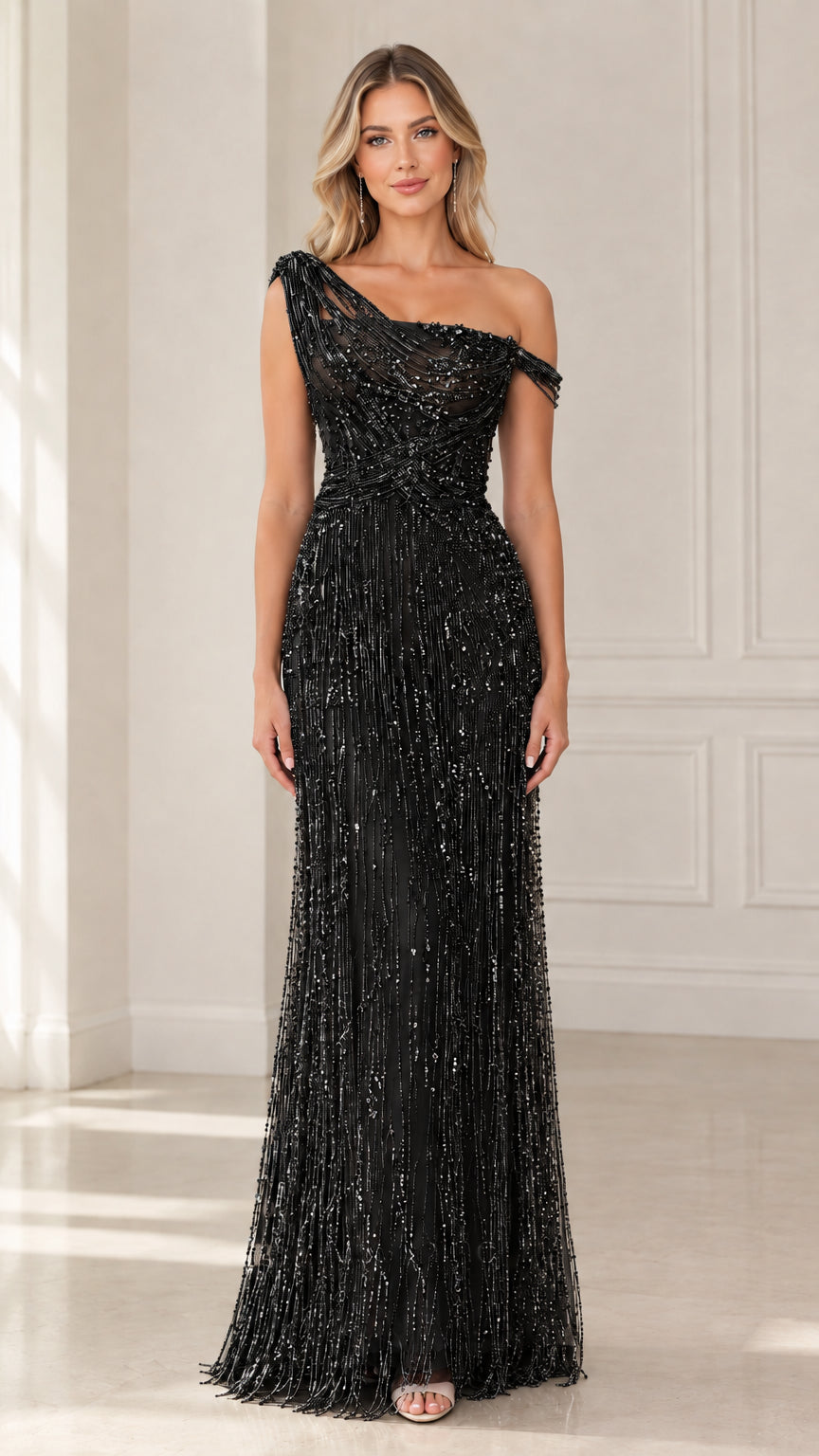 Model wearing Black one-shoulder beaded fringe evening gown