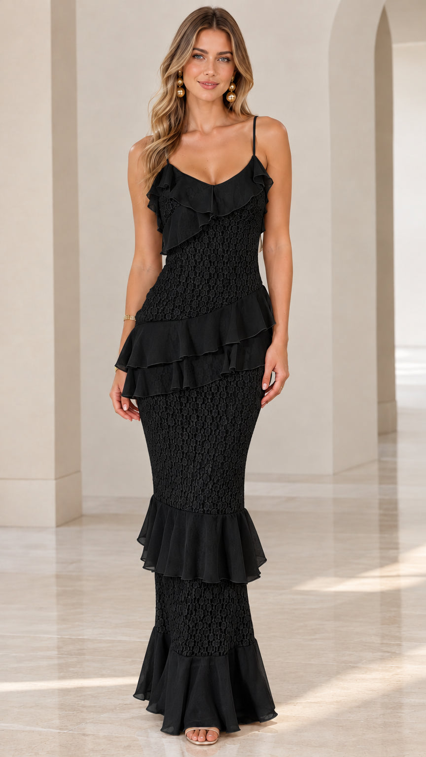Model wearing black tiered ruffle lace maxi dress