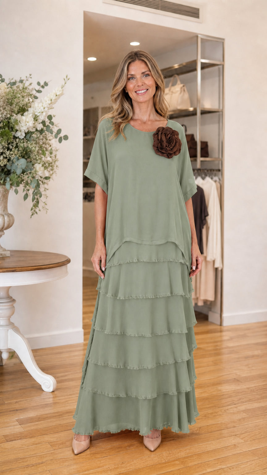 Model wearing sage green tiered ruffle maxi dress