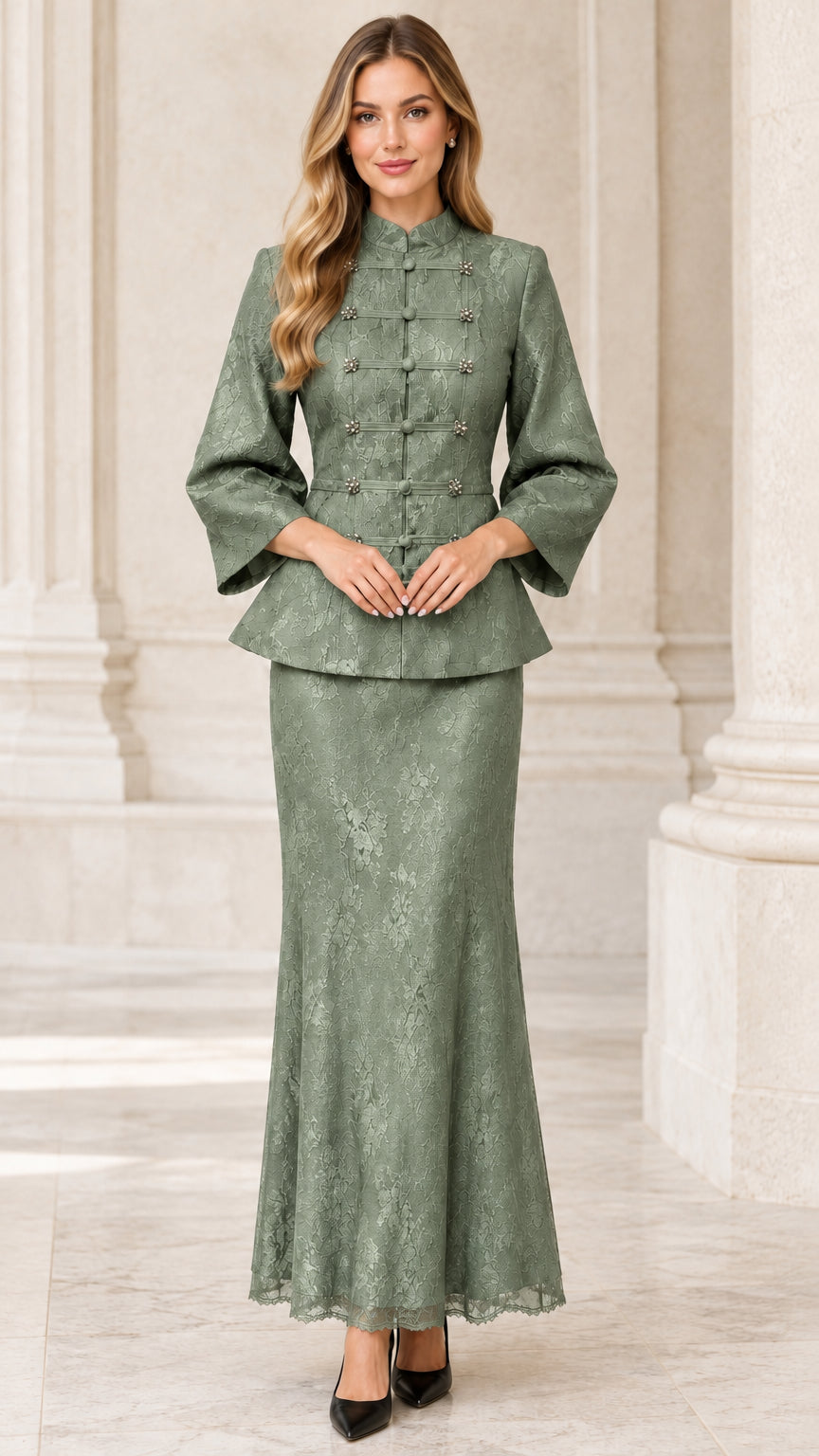 Front view of model wearing sage green lace peplum jacket and maxi skirt set