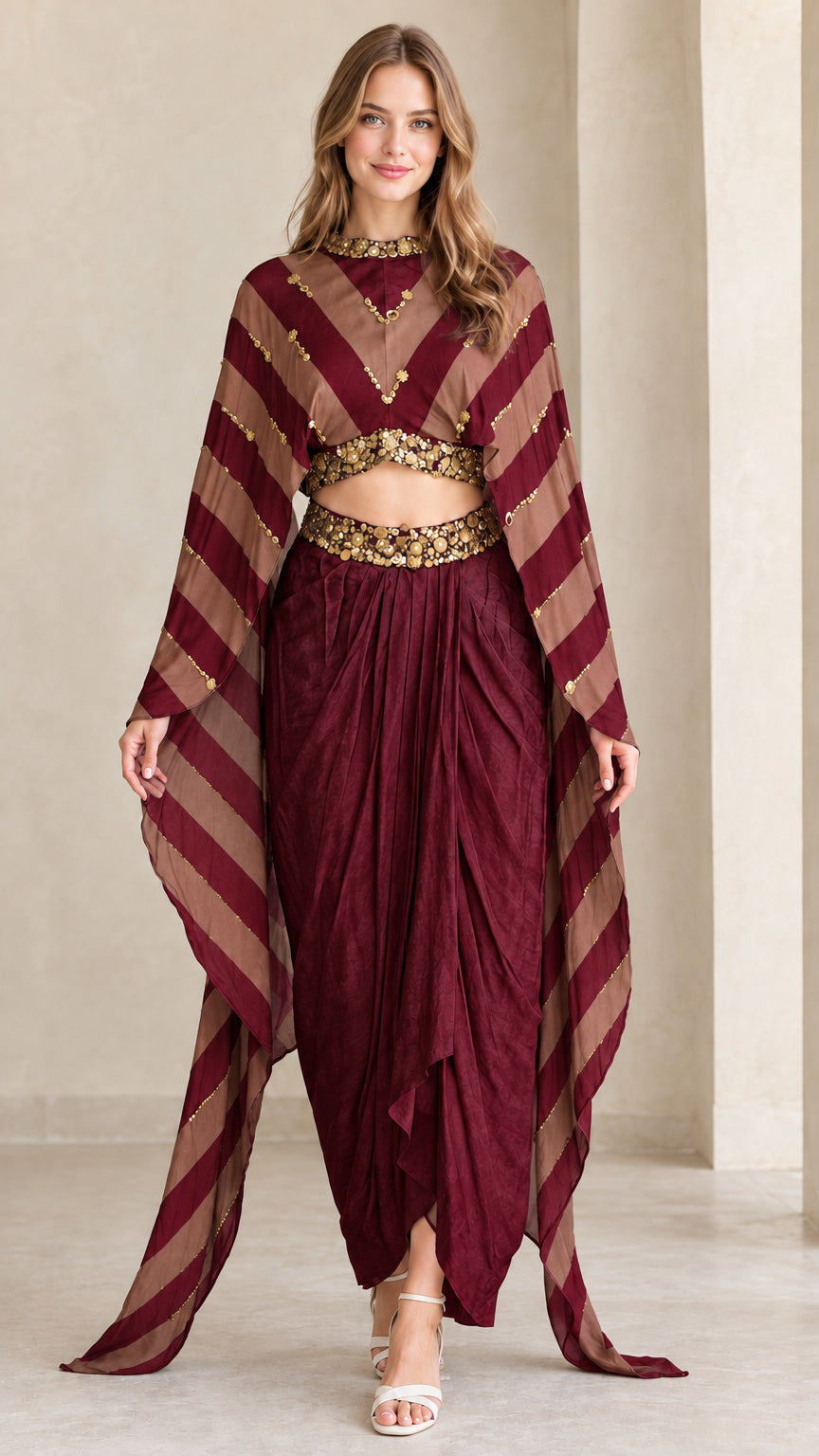 Model wearing Burgundy striped cape top and draped dhoti pant set