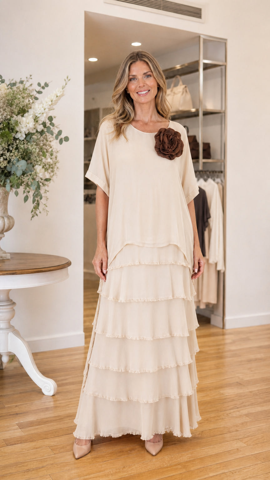 Model wearing beige tiered ruffle maxi dress