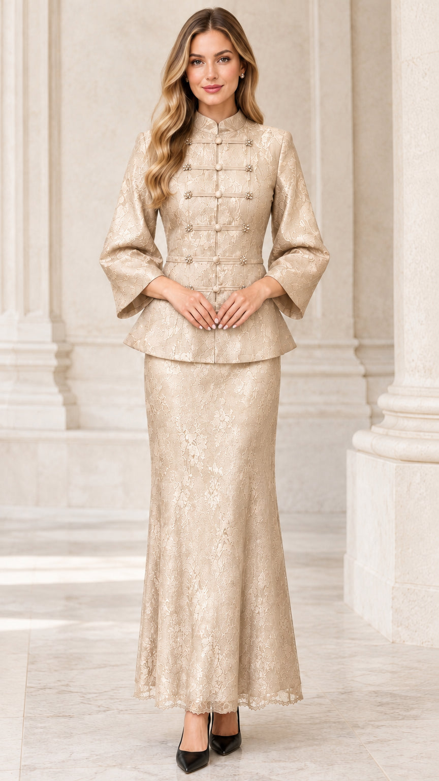 Front view of model wearing champagne gold lace peplum jacket and maxi skirt set