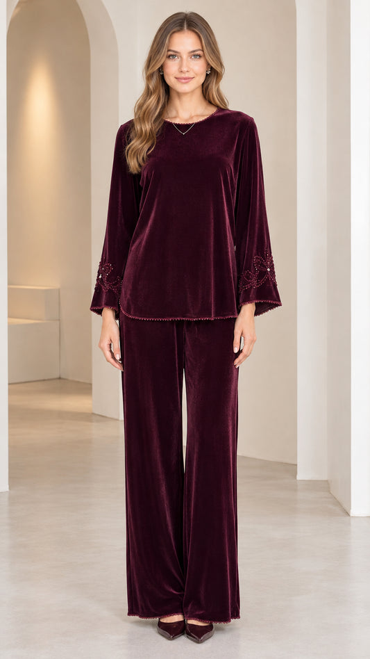 Full front view of model wearing Burgundy velvet two-piece top and wide-leg pant set