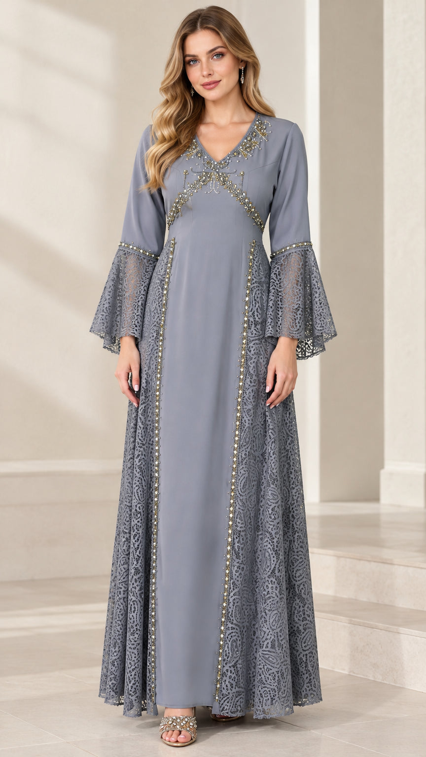 Full front view of a woman wearing a dusty blue beaded V-neck lace panel maxi dress