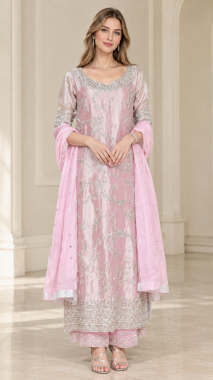 Front view of model wearing Blush Pink embroidered kurta palazzo suit with dupatta