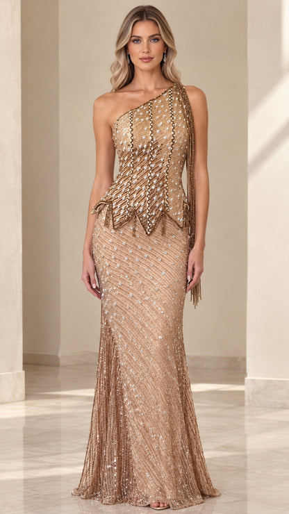 Front view of model wearing Champagne one-shoulder beaded peplum evening gown