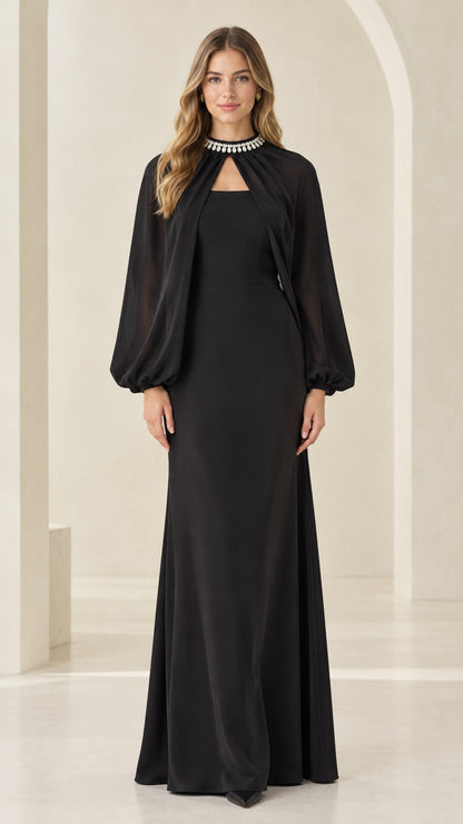 Front full-length view of woman wearing black rhinestone collar cape evening maxi dress