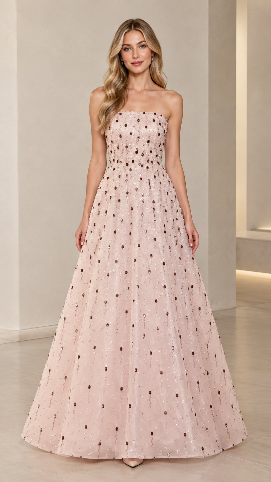 Front view of model wearing Blush Pink strapless sequin A-line evening gown