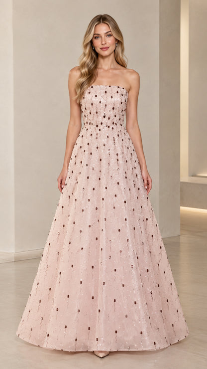 Front view of model wearing Blush Pink strapless sequin A-line evening gown