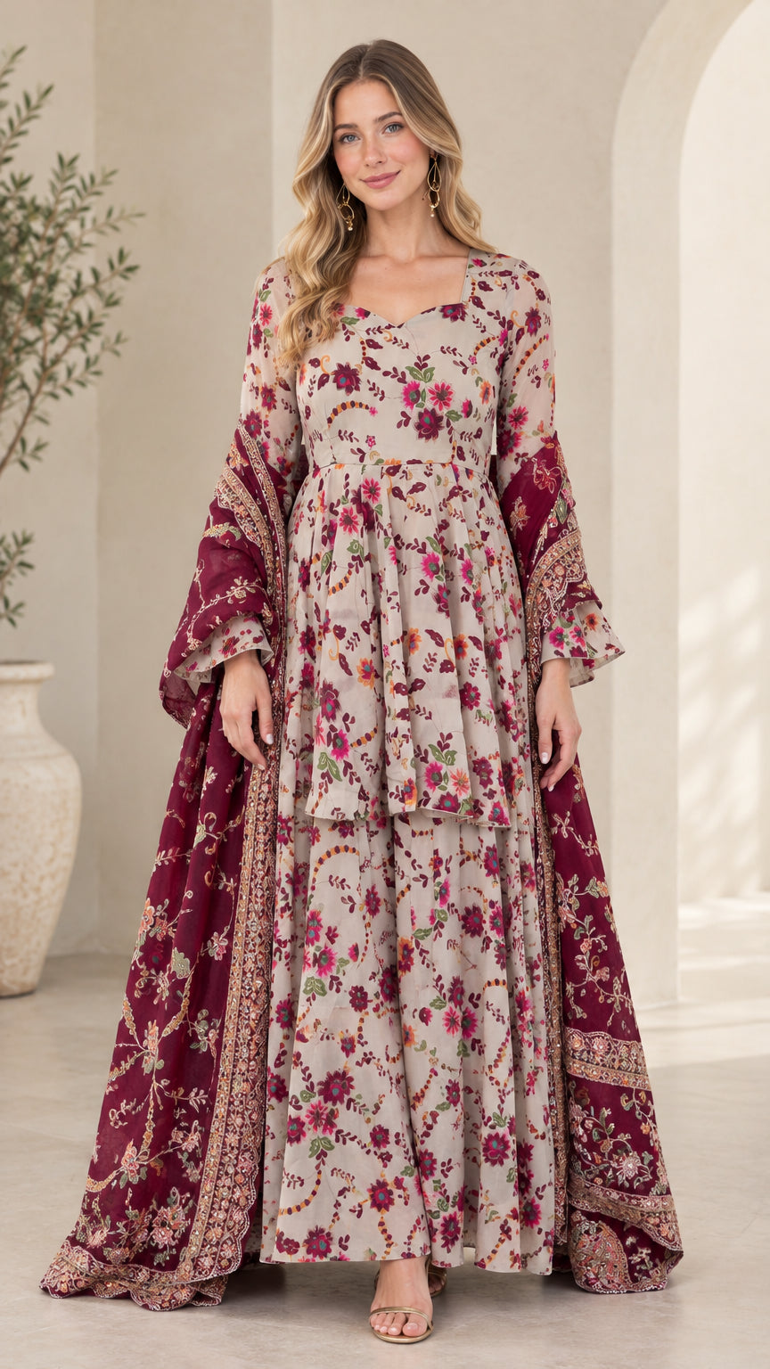 Front full-length view of model wearing cream floral tiered maxi dress with burgundy border scarf