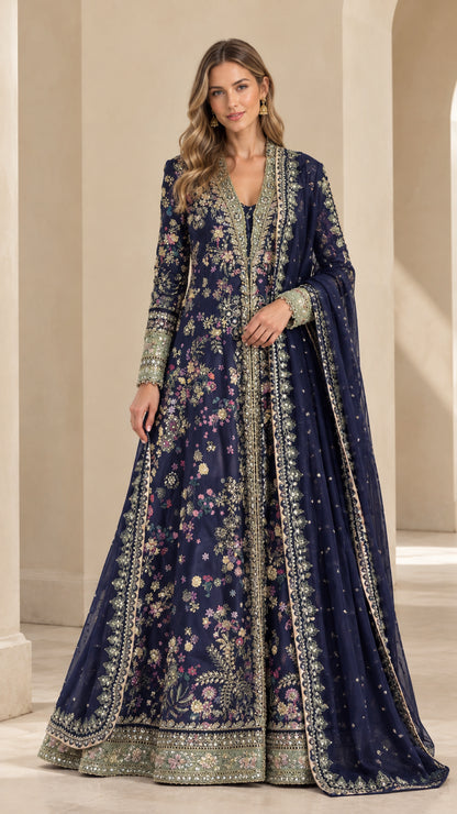 Front view of woman wearing navy blue embroidered floor-length gown with dupatta