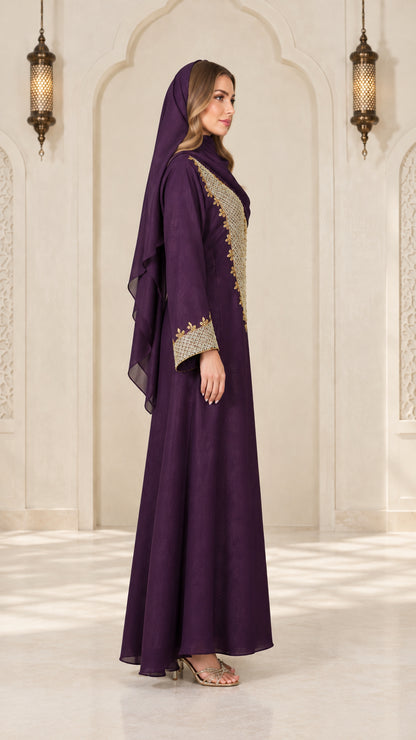 Side profile view of purple modest maxi abaya dress showing drape and sleeve embroidery