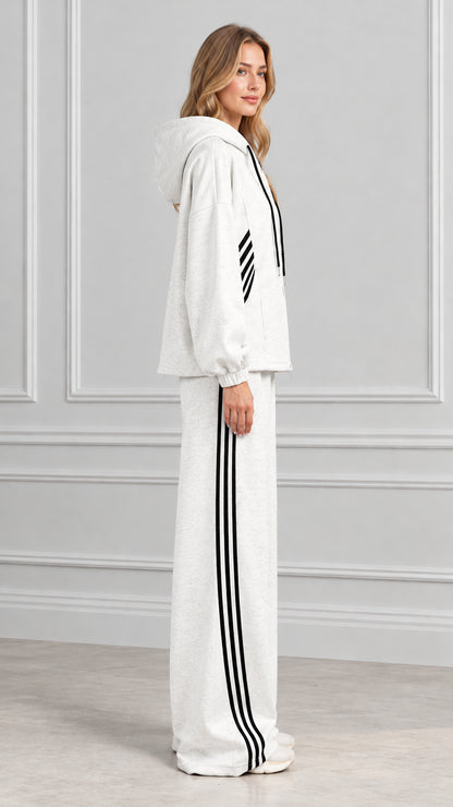 Side view of woman wearing Heather Gray matching tracksuit set