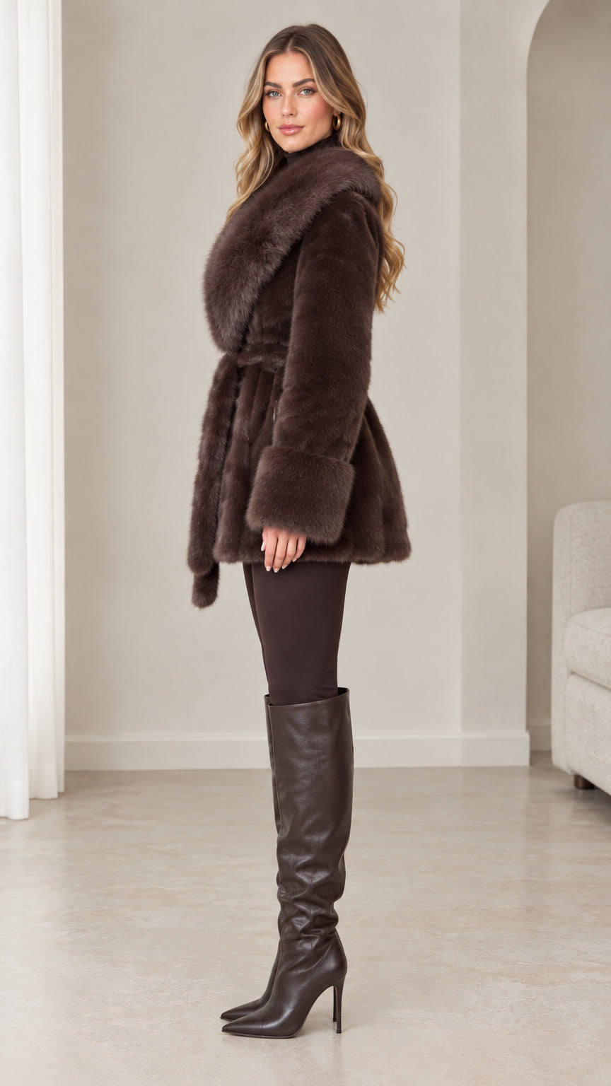 Side profile of model wearing chocolate brown faux fur wrap coat