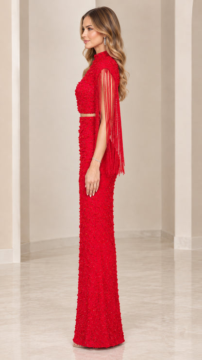 Side profile view of red beaded two-piece maxi formal dress set