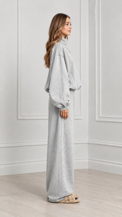 Side profile of women's heather grey matching sweatpants set