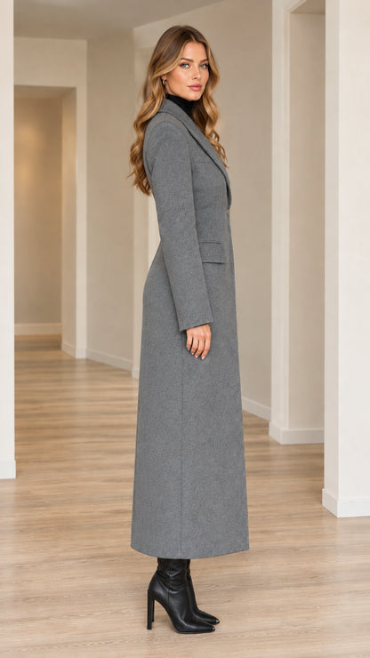 Side profile view of grey longline tailored overcoat showing ankle length