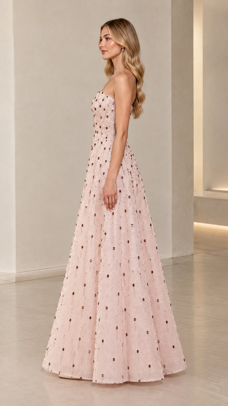 Side profile view of Blush Pink strapless formal maxi dress with sequin details