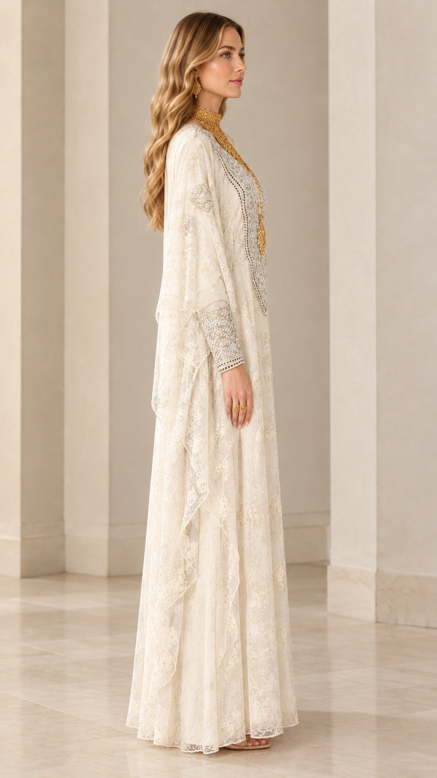 Side profile of women's ivory lace kaftan dress showing draped sleeve and floor-length cut