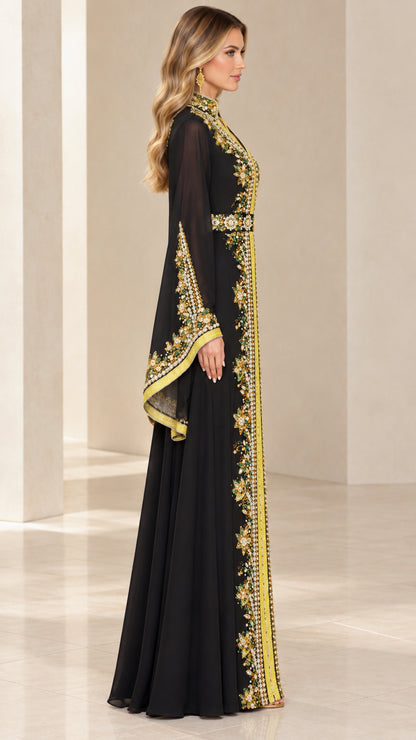 Side profile view of black caftan dress showing flared sleeves and full length