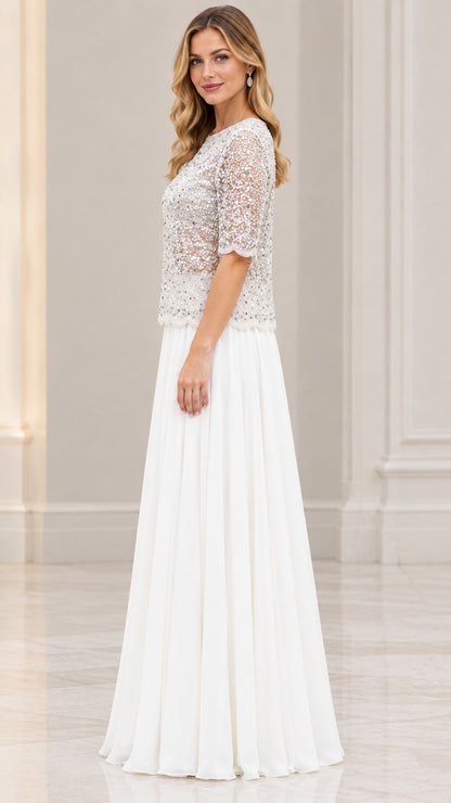 Side angle view of model in Ivory half sleeve sequin chiffon evening dress