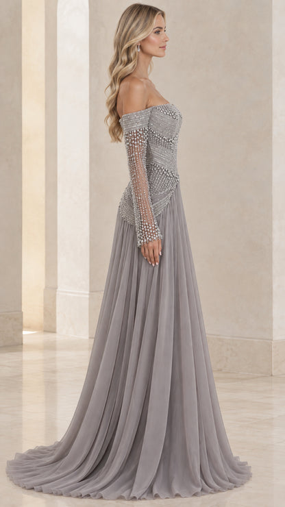 Side profile of model in slate gray off-the-shoulder long sleeve formal dress