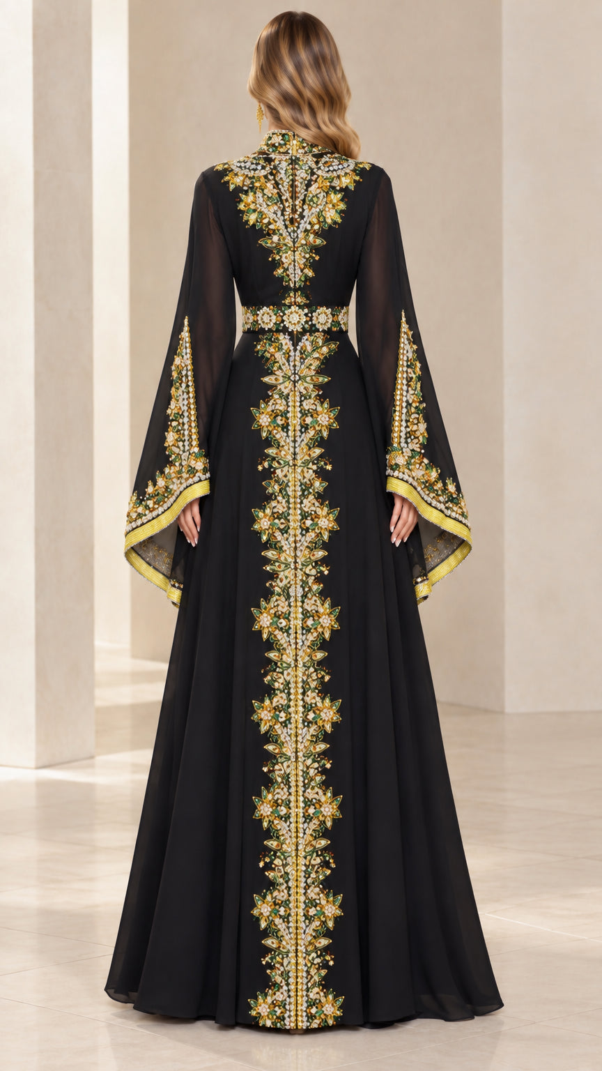 Back view of black caftan dress highlighting ornate center embroidery