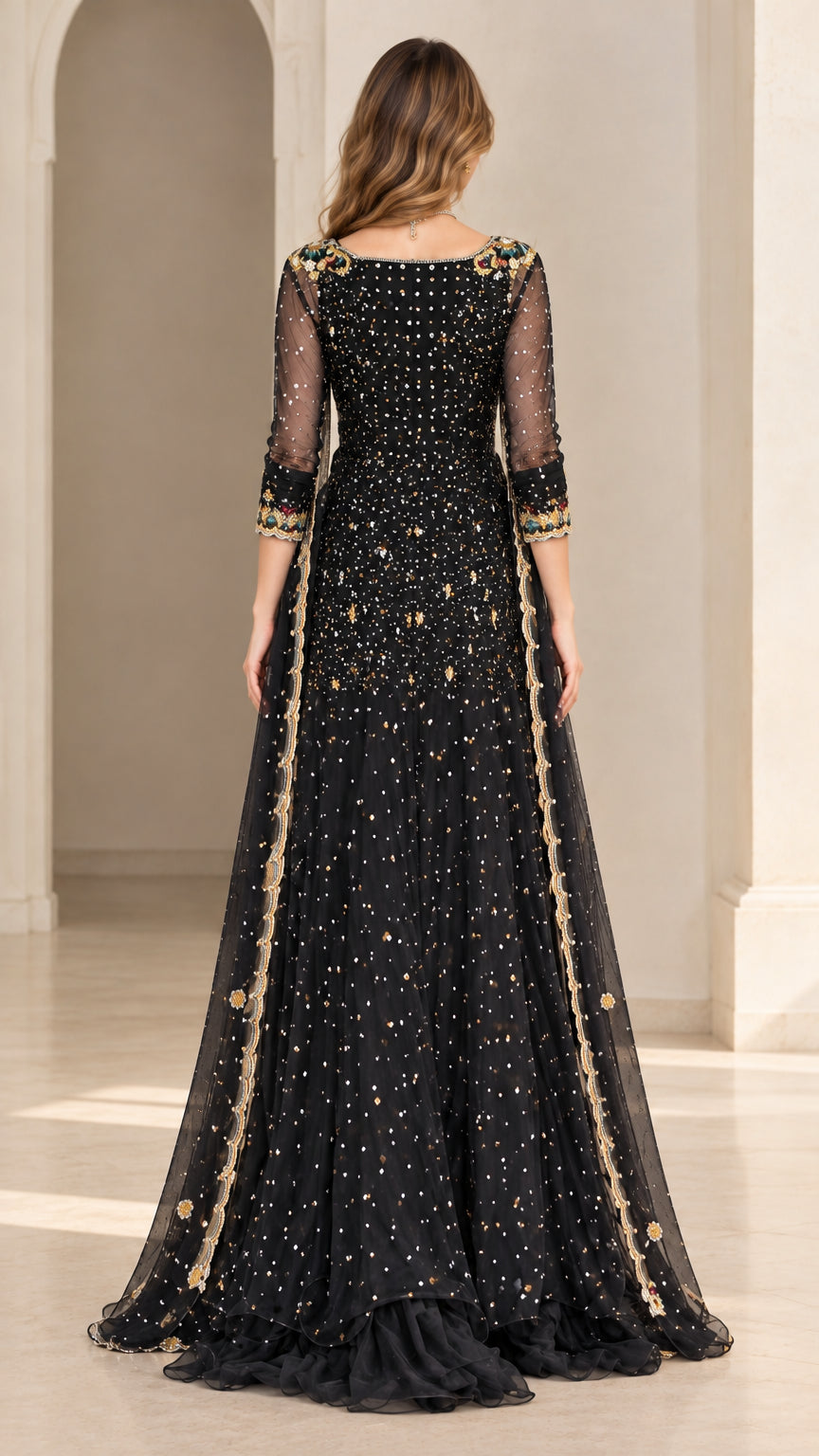 Back view of black sequined evening tunic and flowing flared bottoms