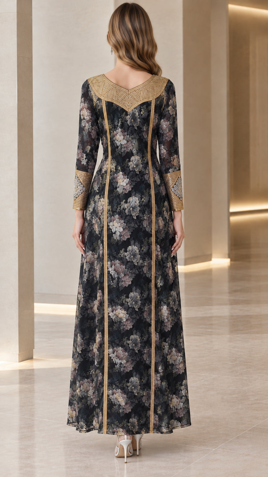 Back view of model wearing black floral maxi dress with back yoke embroidery