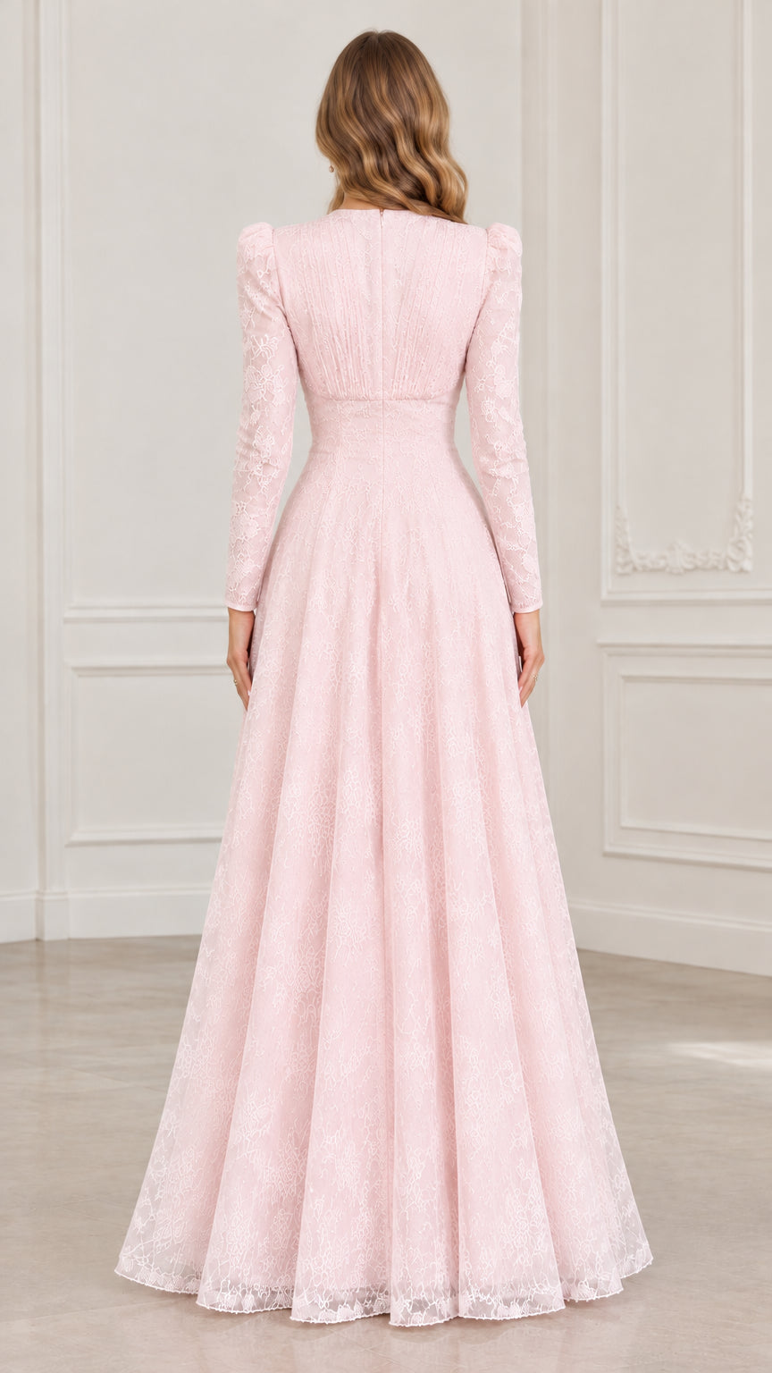 Back view of woman wearing long sleeve blush pink lace maxi dress showing smooth back fit