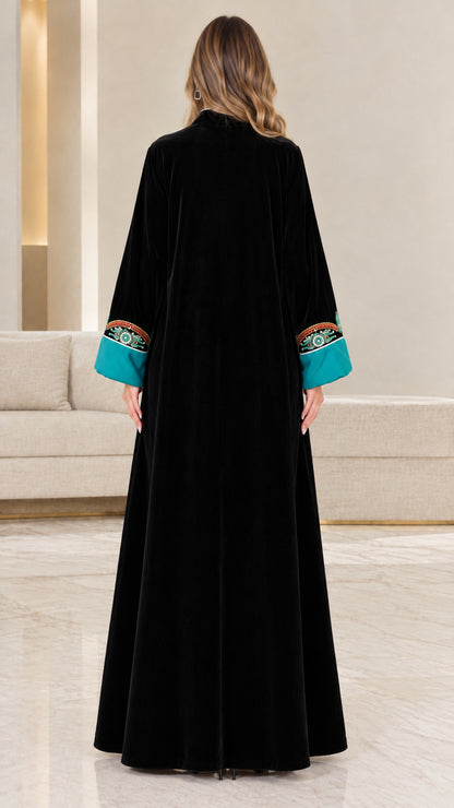 Back view of floor-length black velvet abaya