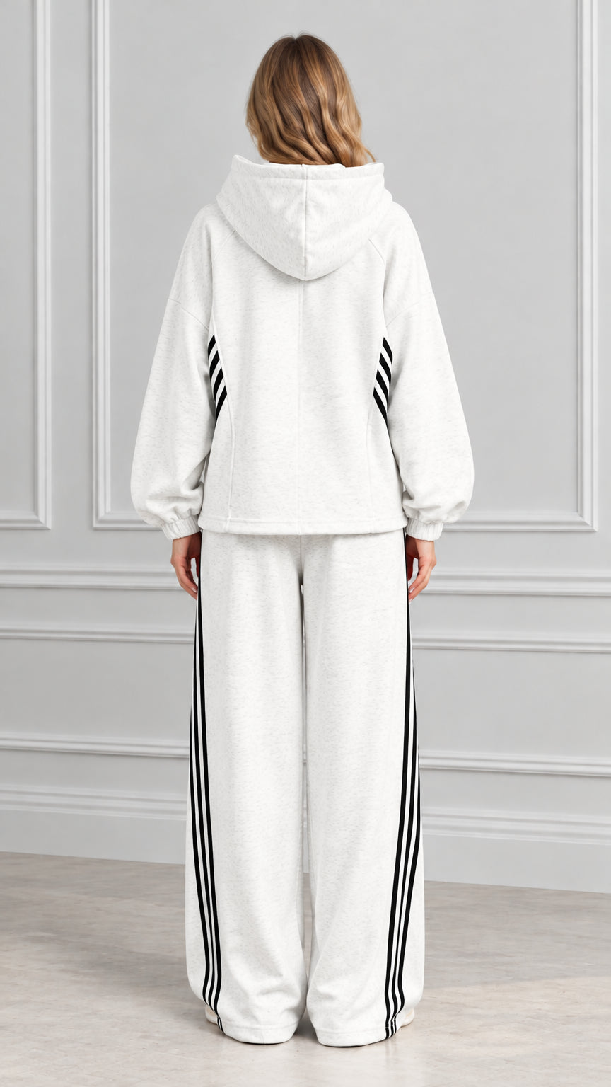 Back view of woman wearing Heather Gray hooded sweatshirt and wide-leg lounge pants