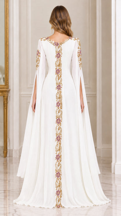 Back view of white formal embroidered gown displaying continuous back trim detail