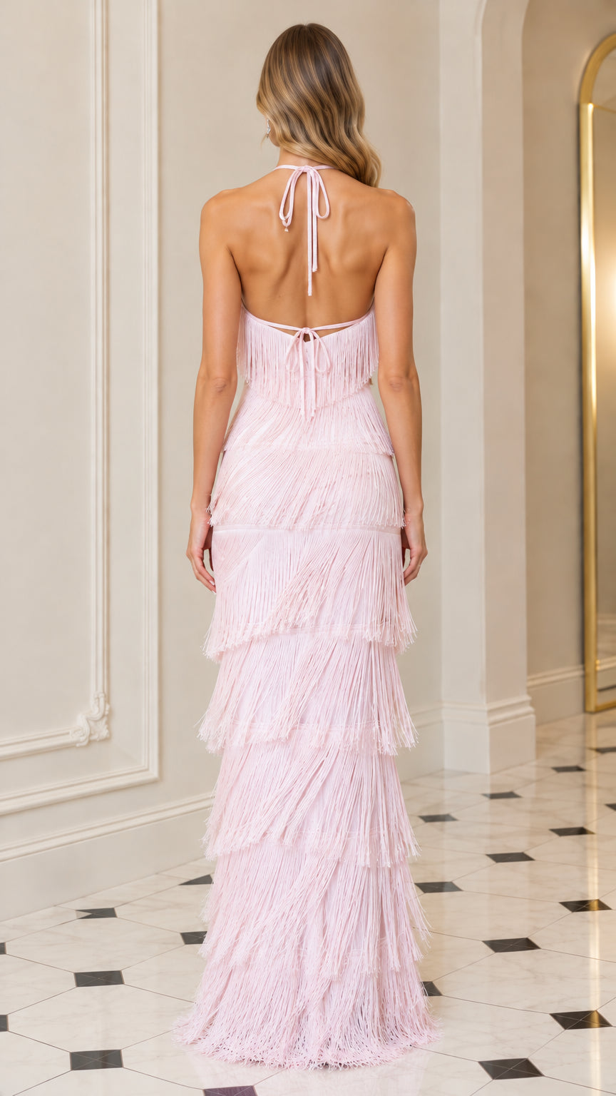 Back view of model showing open back and tie detail on Blush Pink fringe gown