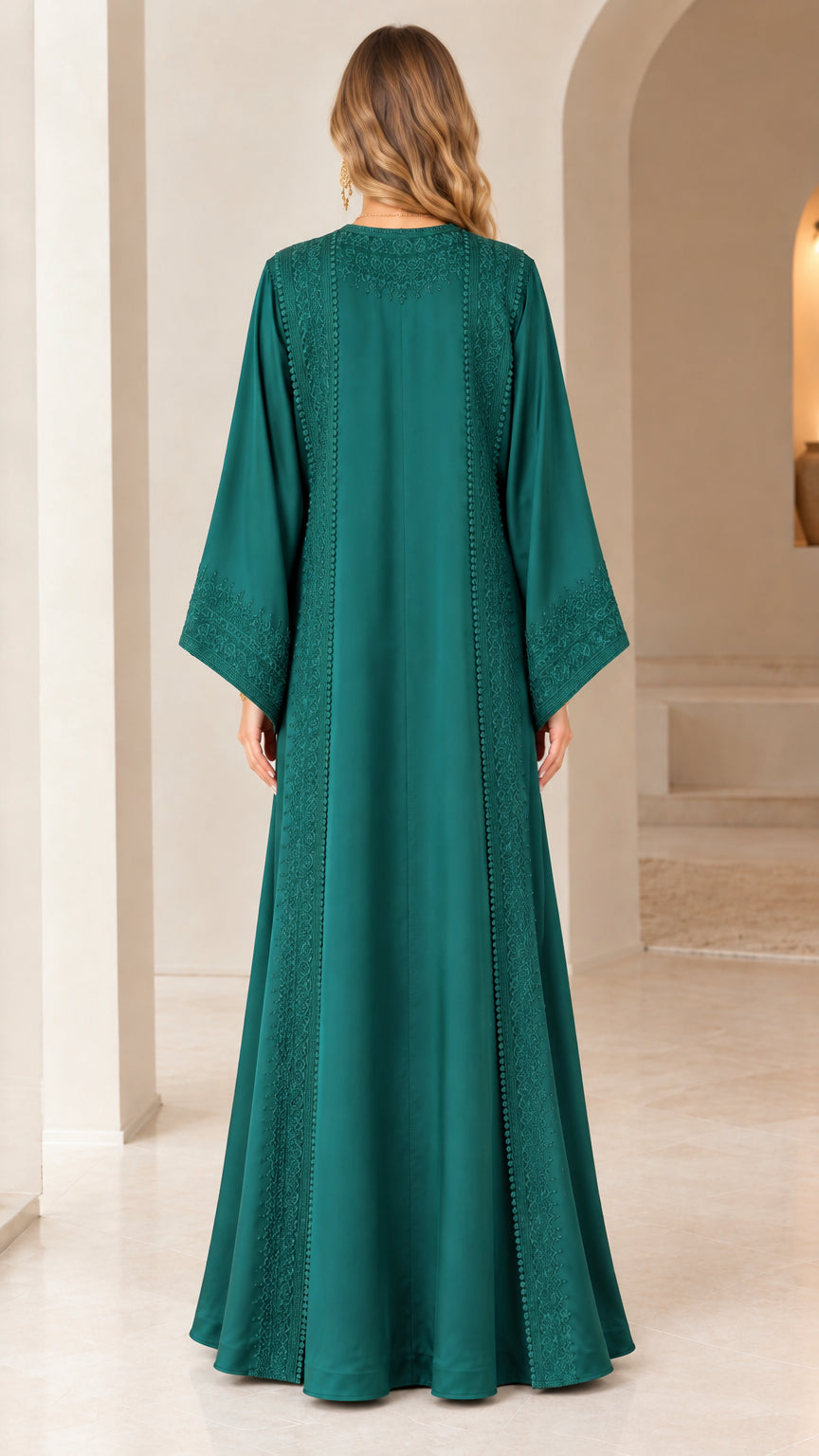 Back view of woman wearing emerald green floor-length caftan dress