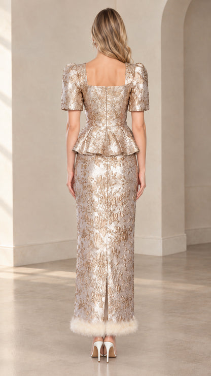 Back view of champagne jacquard peplum top and slit maxi skirt set