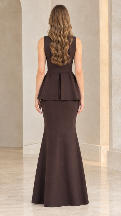 Back view of woman wearing chocolate brown peplum mermaid evening gown