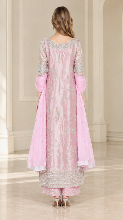 Back view of model wearing Blush Pink embroidered 3-piece suit with scarf