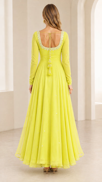 Back view of Lime Green Anarkali gown showing open back with hanging tassel details