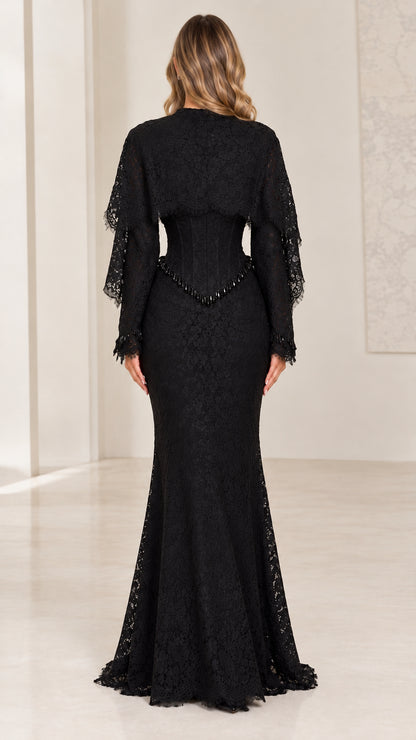 Back view of floor-length black lace evening dress
