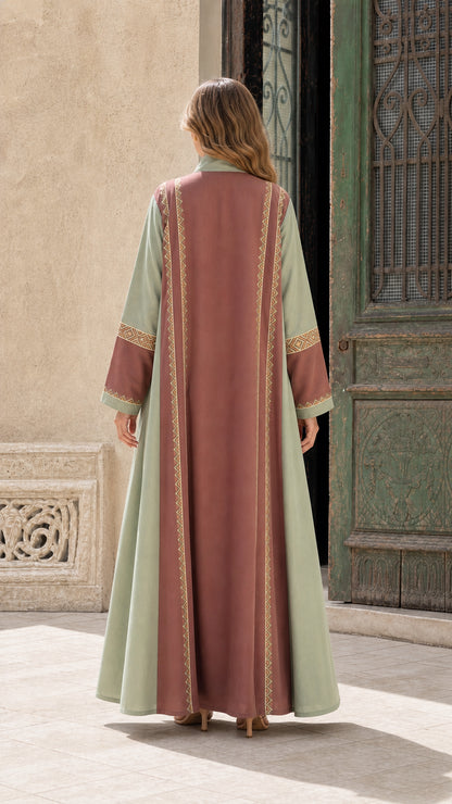 Back view of sage green maxi coat showing clean drape
