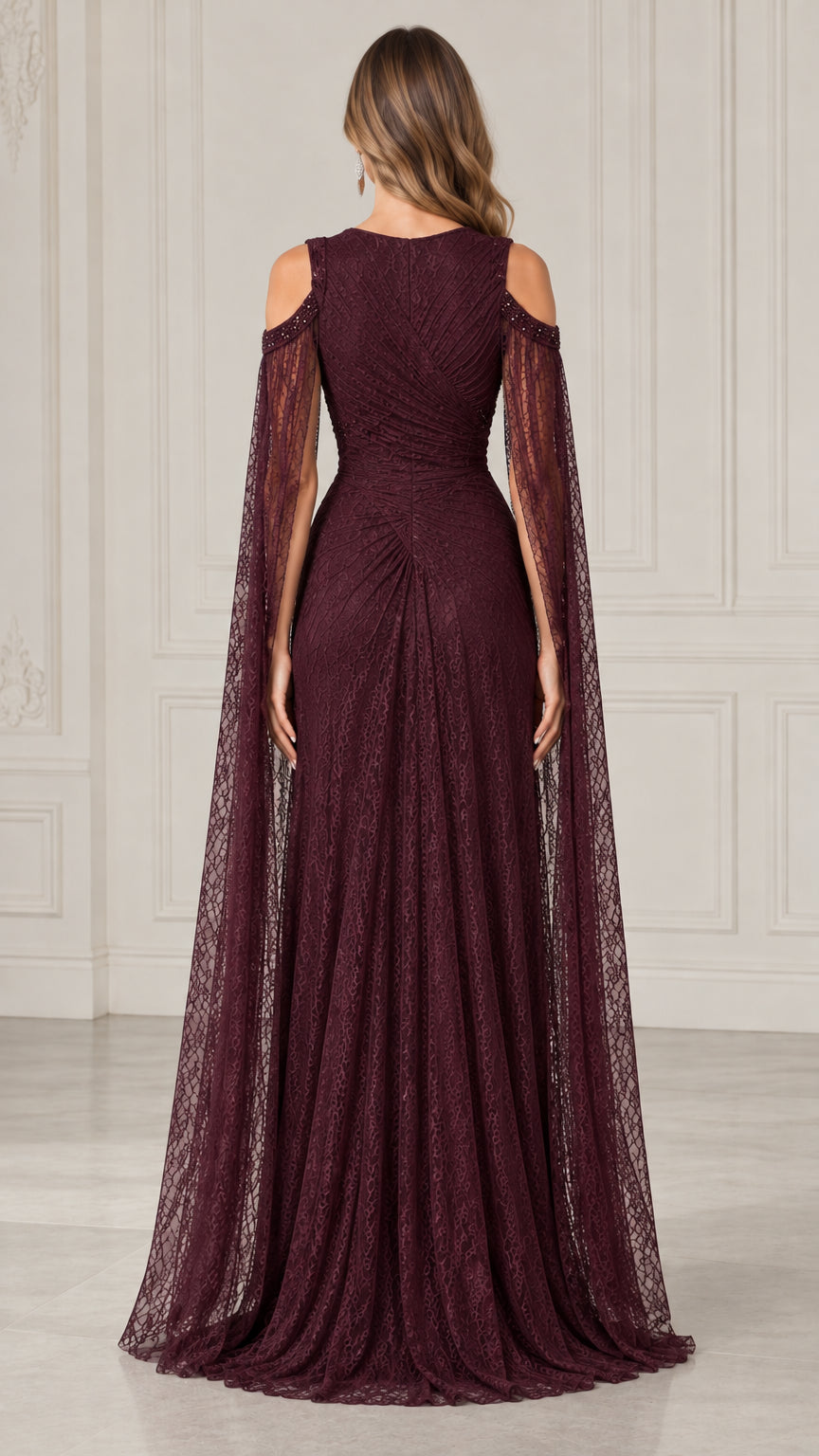 Burgundy floor length lace gown back view with draped cape details