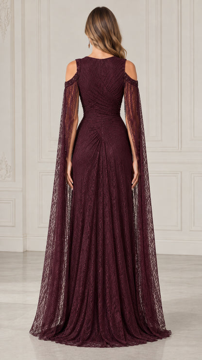 Burgundy floor length lace gown back view with draped cape details