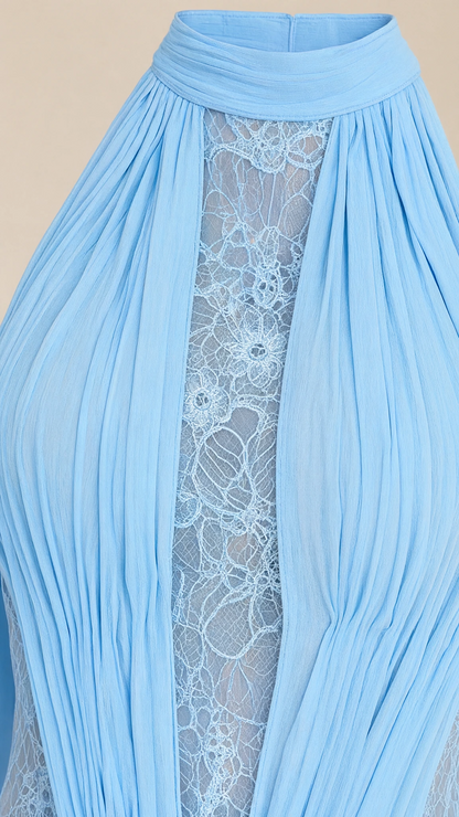 Close-up detail of halter neckline, pleating, and intricate sheer lace insert
