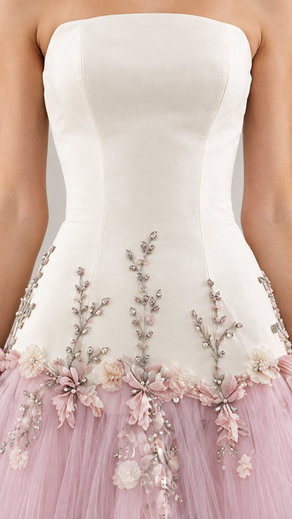 Close-up detail of 3D floral embroidery and embellishments on gown waistline