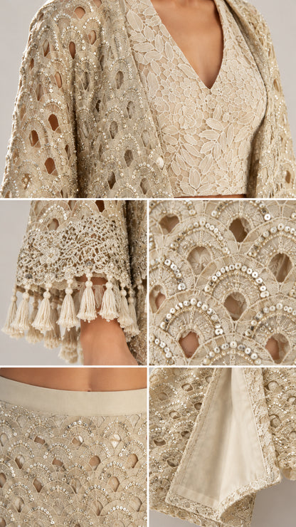 Close-up details of sequin embroidery, tassel sleeve trim, and lined construction on Champagne set